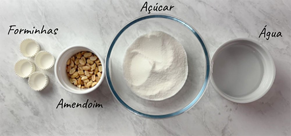 Visão dos ingredientes e acessórios para modelar o cajuzinho